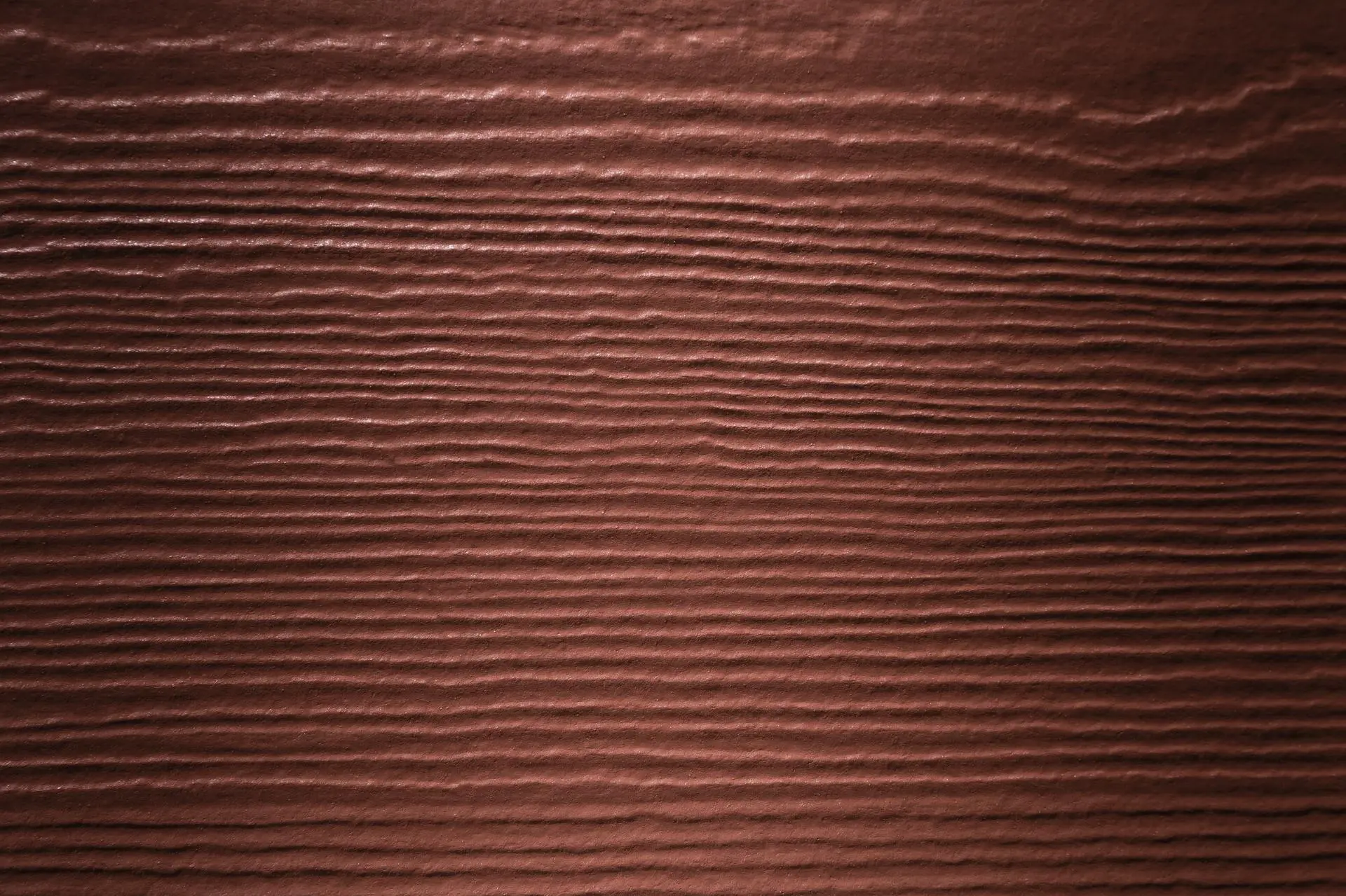 Bild Oberfläche / Detail Fassadenpaneele Skandinavisches Rot ähnlich RAL 3009 Faserzement James Hardie Holzstruktur James Hardie