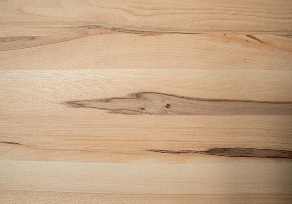 Bild Oberfläche / Detail Leimholzplatte Kernbuche gedämpft durchgehende Lamellen vorgeschliffen