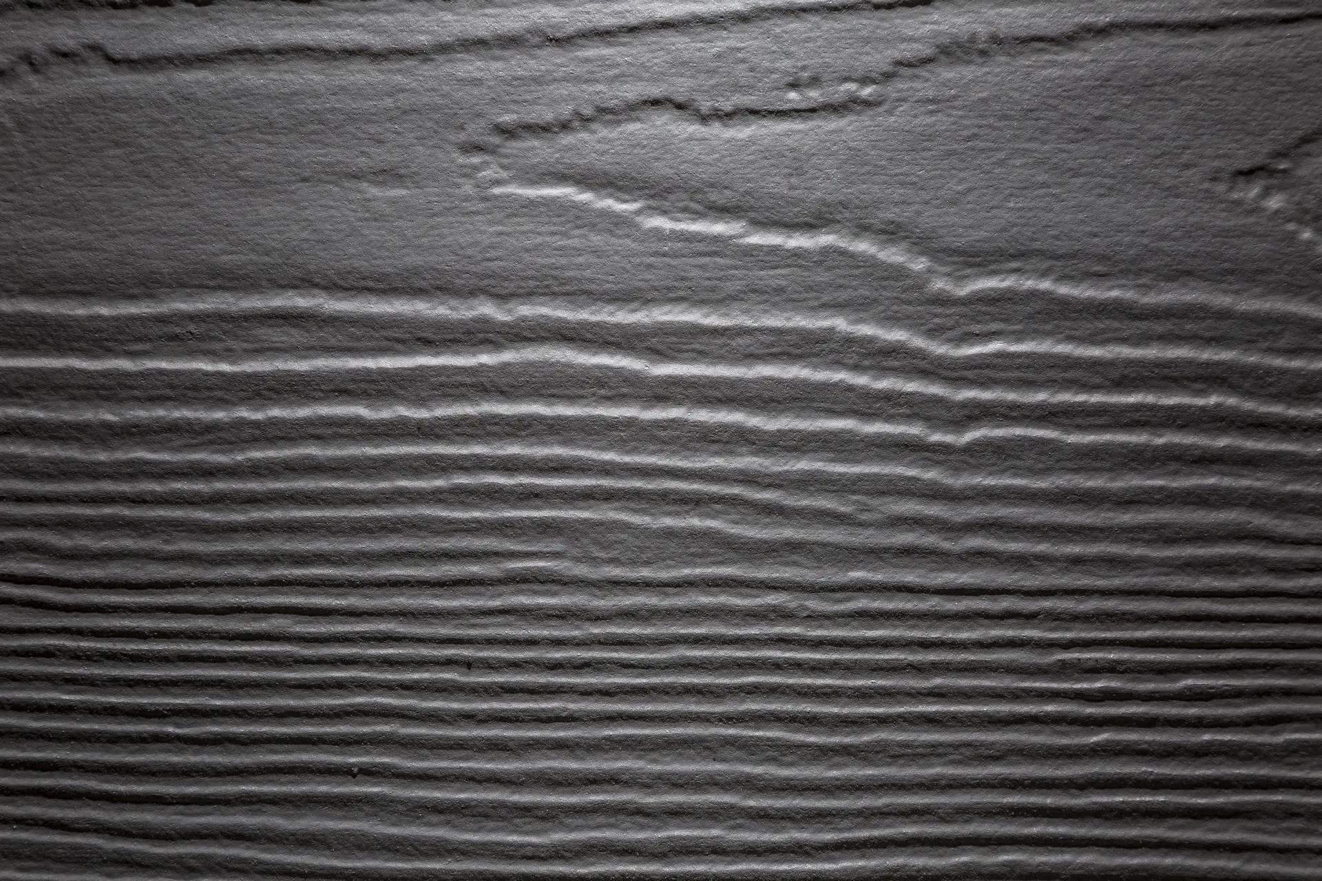 Bild Oberfläche / Detail Fassadenpaneele Metallgrau ähnlich RAL 7043 Faserzement James Hardie Holzstruktur James Hardie
